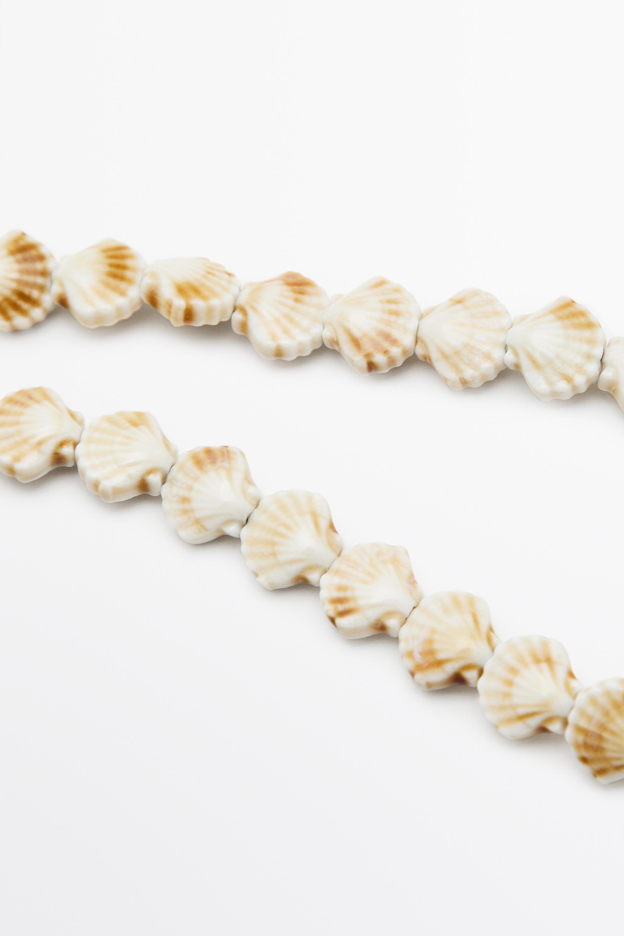 Collier coquillages céramique